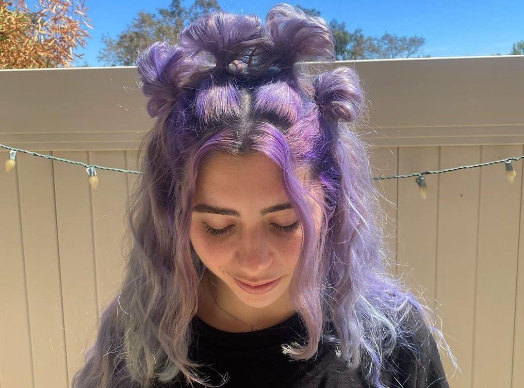 girl with purple messy buns